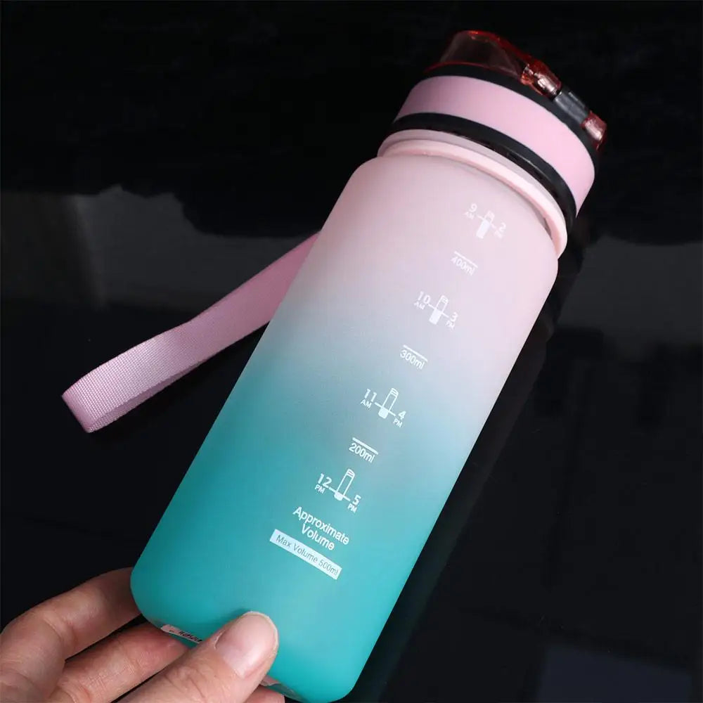 Botella deportiva de 1 litro, color degradado, portátil y a prueba de fugas.