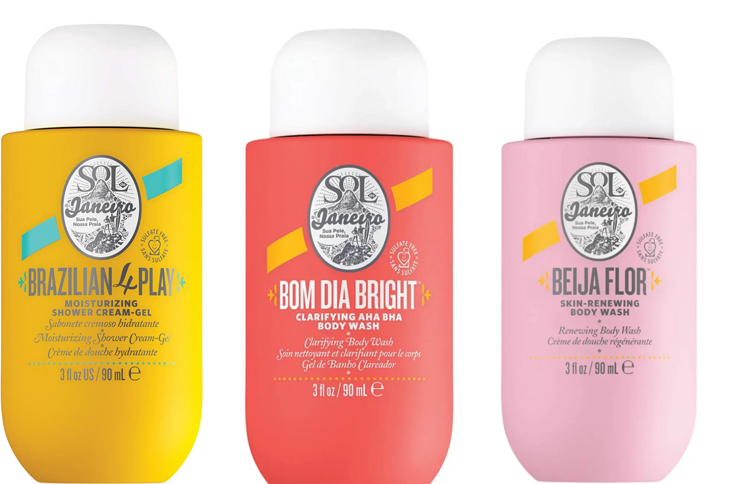 Three 3 fl oz bottles of SP Janeiro body wash products lined up side-by-side on a white background: Brazilian 4-Play shower cream-gel in yellow, Bom Dia Bright classifying body wash in coral-red, and Beija Flor skin renewing body wash in pink.