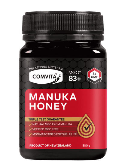 Comvita Manuka Honey jar with black lid on a transparent background