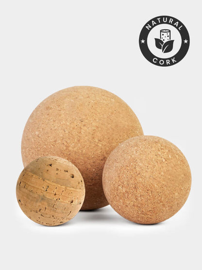 Three cork balls with a 'Natural Cork' logo on a light gray background