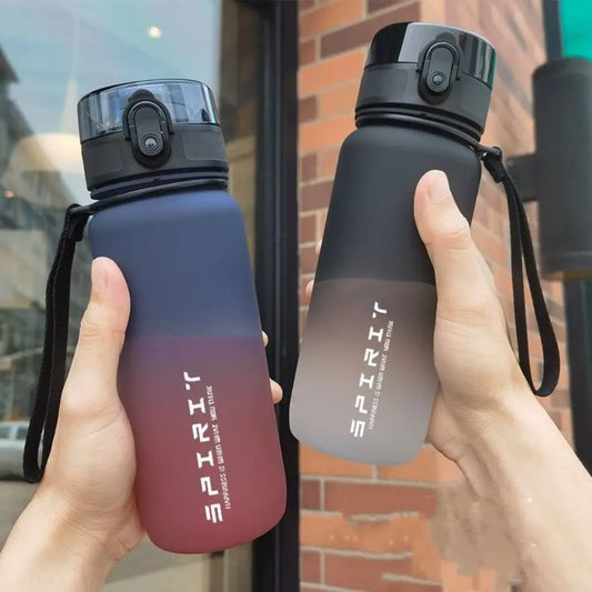 Botella deportiva de 1 litro, color degradado, portátil y a prueba de fugas.