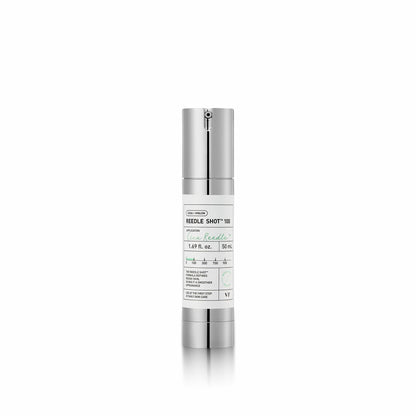 Skincare serum bottle with silver cap and white label on a white background